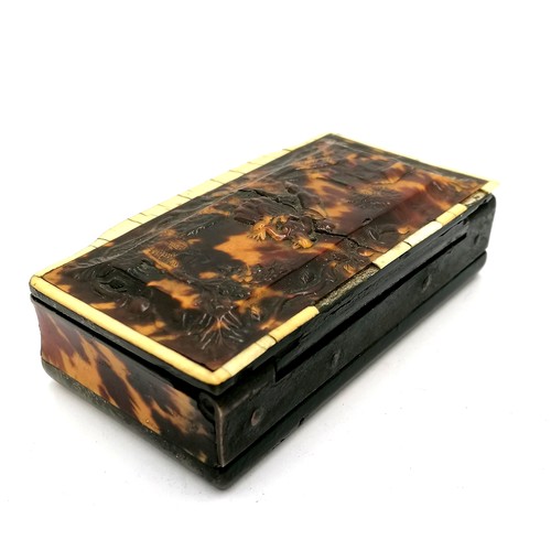 519 - Antique continental large tortoiseshell table snuff box with moulded scene to top depicting a courti... 