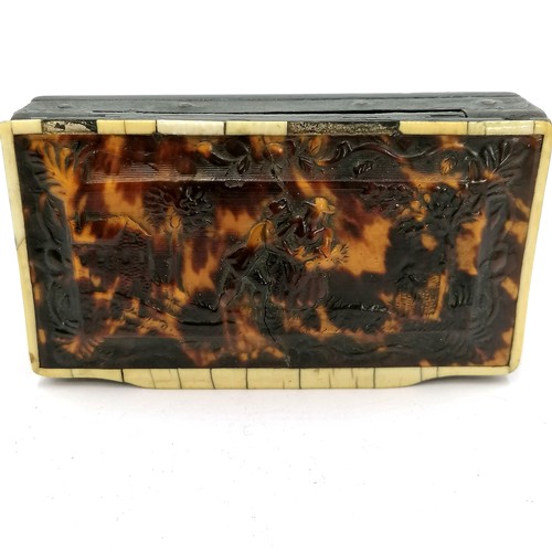 519 - Antique continental large tortoiseshell table snuff box with moulded scene to top depicting a courti... 