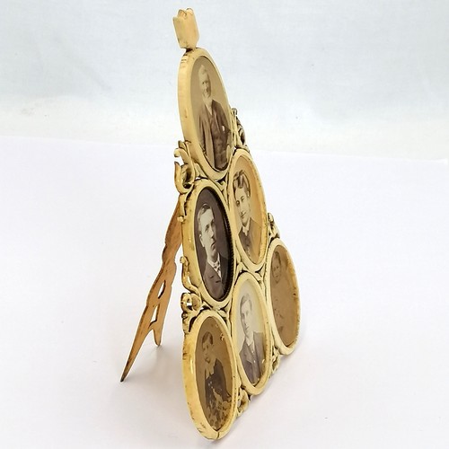 533 - Antique ivory easel stand picture frame with original photographic portraits - 17cm high with old cr... 