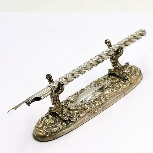 564 - Edwardian silver pen rest with a silver dip pen (16cm long) by J C Plimpton & Co. In good condition