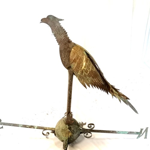 576 - Large scale copper weather vane with a pheasant in flight. Has had a repair to the wing. Approx. 1m ... 