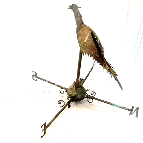 576 - Large scale copper weather vane with a pheasant in flight. Has had a repair to the wing. Approx. 1m ... 