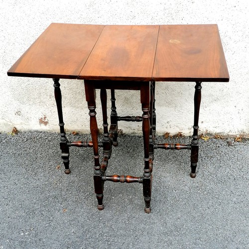 604 - Antique mahogany Sutherland table with turned base, 62cm high x 73cm wide x 55cm deep,1 mark to one ... 