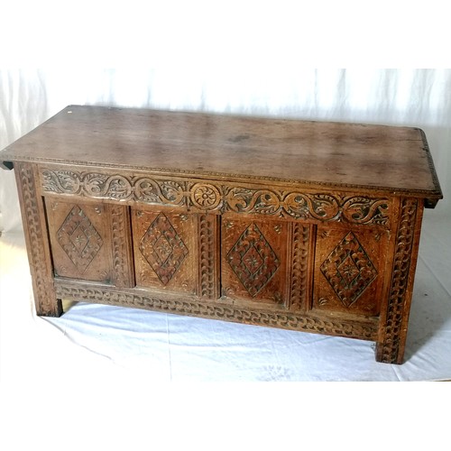 611 - Large antique elm reconstructed coffer with 4 panel front with carving & frieze decorated with carve... 