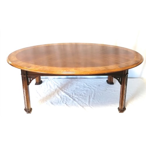 612 - Mahogany & walnut veneer oriental style oval coffee table - 112cm x 67cm x 42cm & has some marks to ... 