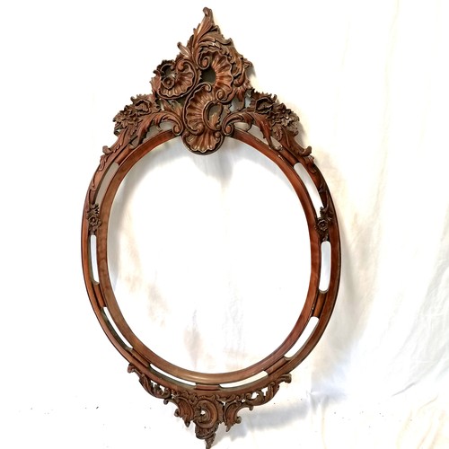 616 - Large ornate carved mahogany oval frame - 141cm x 84cm