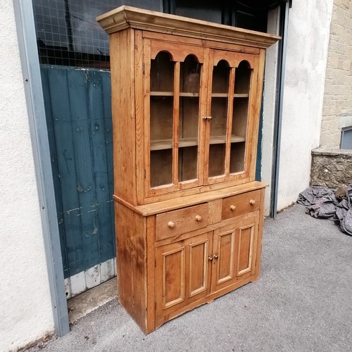 635 - Antique pine dresser with glazed cupboard top and 2 door cupboard and drawers to base. In good condi... 