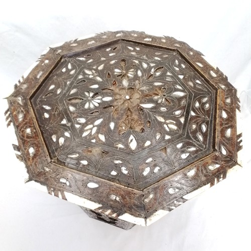 646 - Islamic mother of pearl & ivory inlaid octagonal table with losses & old woodworm - 47cm high 39cm d... 