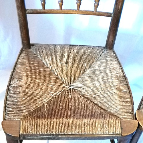 648 - pair of antique rush seated country chairs, in good condition.