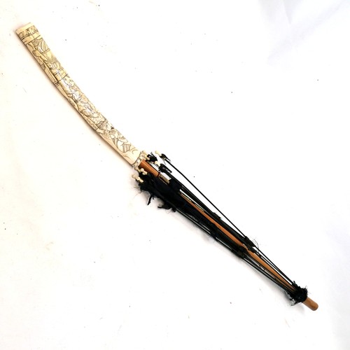 673 - Japanese carved bone handled parasol (no fabric!) - carved in 3 sections to resemble a samurai sword... 