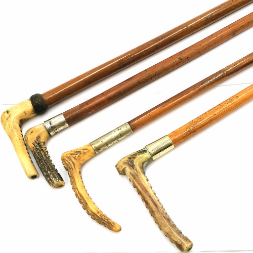 676 - 4 antique malacca riding crops, longest 85cm with bone handle, the other 3 with antler grips