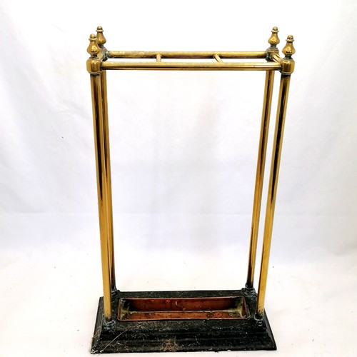 681 - Antique cast iron and brass stick stand with original copper tray - 62cm high 38cm wide 18cm deep