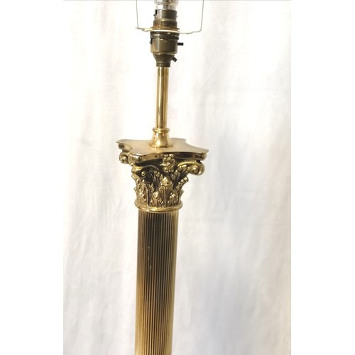 701 - Corinthian column brass standard lamp with lion paw feet - total height 140cm