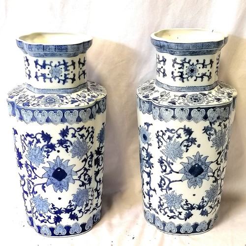 706 - Chinese pair of blue & white vases (1 has chip to rim + crack) - height 49cm