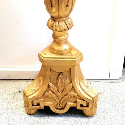 745 - Large carved wood gilded pricket candlestick. 86cm high