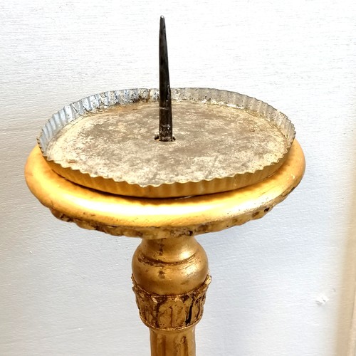 745 - Large carved wood gilded pricket candlestick. 86cm high