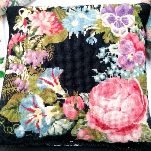 1 - 7 tapestry cushions incl. a black floral cushion, mostly feather filled.