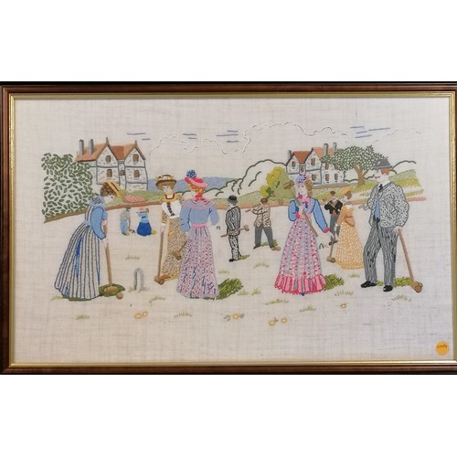 388 - A vintage framed embroidery of a croquet match, 58cm x 37cm