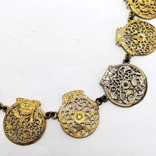 328 - Antique gilt metal collar of watch parts. 44cm long