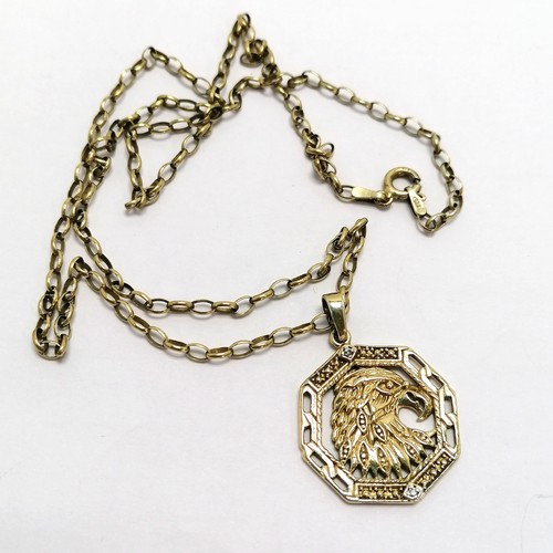 369 - Silver gilt chain (50cm) with white stone set eagle pendant in a Manchester United box