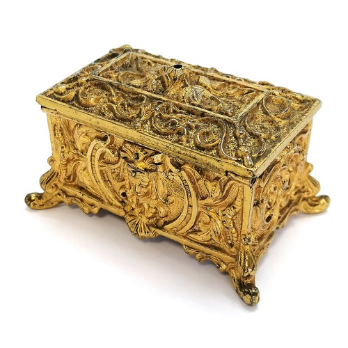 516 - Antique gilt brass Egyptian revival go-to-bed / ring box ~ 7.5cm across & 4cm high & in good conditi... 