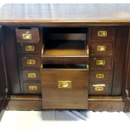 753 - Antique oak collectors / opticians cabinet with 11 drawers & cupboards to both ends (lacking handles... 