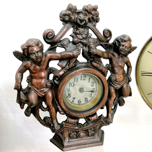 19 - Smiths quartz clock on stand (battery holder needs attention) + cast iron cherub decorated manual wi... 