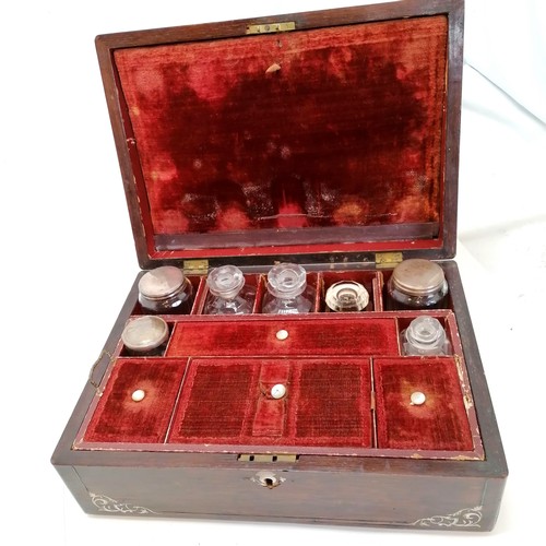 26 - Antique rosewood & mother of pearl inlaid travelling box with original fittings & plated lids to gla... 