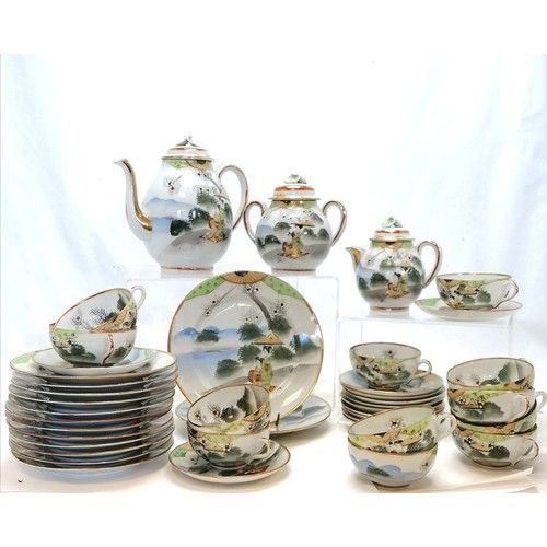 107 - Japanese egg shell 12 setting tea service t/w teapot, sugar basin, milk jug, 2 sandwich plates - in ... 