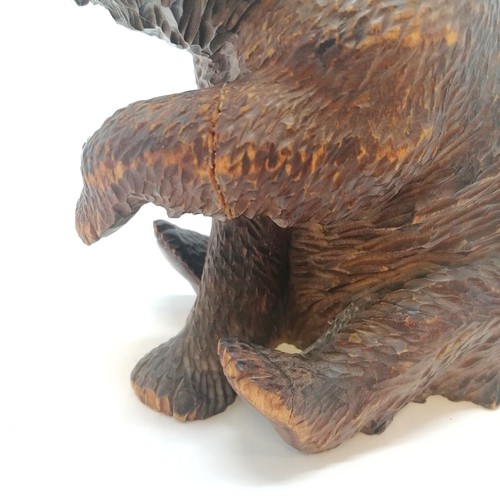 126 - Antique large scale black forest bear - 19cm high & has repaired front leg & 1 foot