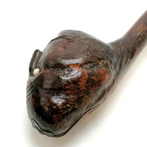 134 - Tribal antique throwing stick - 52cm long with a carved head terminal with bead glass eyes & flower ... 