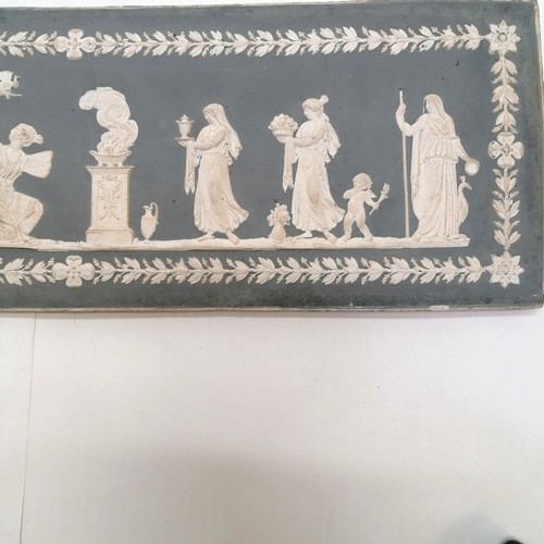 135 - Antique panel / tile with classical decoration in relief with a leaf & floral border - 46cm x 15.5cm