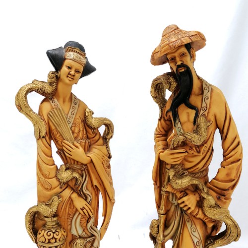 148 - Pair of decorative oriental figures - tallest 49cm high