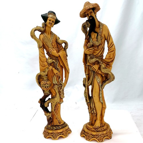 148 - Pair of decorative oriental figures - tallest 49cm high