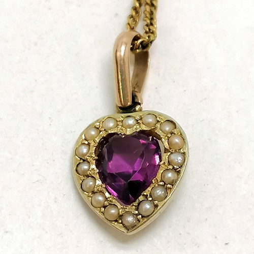 239 - 9ct gold heart amethyst / pearl pendant on a 9ct gold chain (50cm) - total weight 4.4g