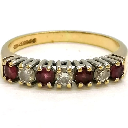 249 - 18ct gold ruby (4) & diamond (3) ring - size M½ t/w 18ct gold white stone set flower ring - size K½ ... 