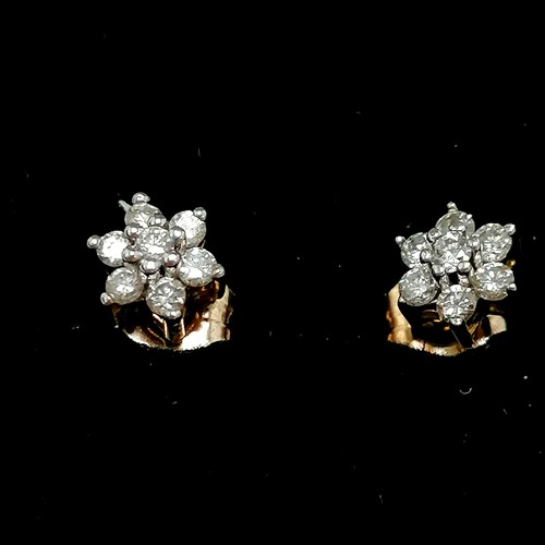 257 - Pair of 9ct gold diamond cluster earrings