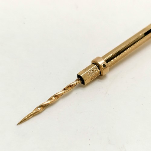 269 - 9ct gold combination swizzle stick / olive pick - extended length 14cm & total weight 5.8g