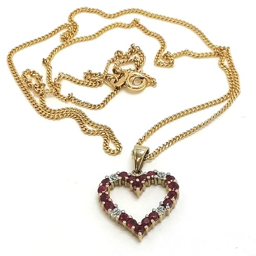 278 - 9ct gold diamond & ruby heart pendant on a 9ct gold chain (44cm) - total weight 3.8g