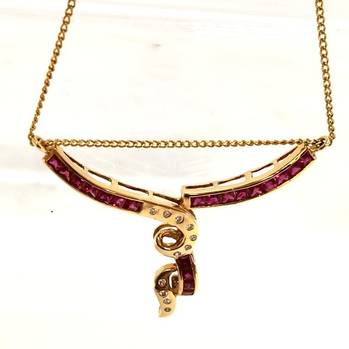 340 - 18ct gold ruby & diamond set pendant on chain (40cm long) a/f - total weight 5g