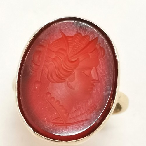 350 - 18ct gold intaglio ring of a classical head in the Roman taste - 2cm height & 4.4g total weight