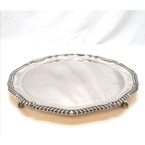 354 - Silver salver with gadroon edge & 4 ball and claw feet - 37cm diameter & 1293g ~ in good condition