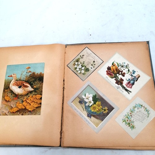 385 - Victorian scrap book containing  42 pages of scraps, 32cm x 27cm, in bright condition but edges of p... 