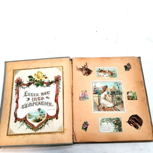 385 - Victorian scrap book containing  42 pages of scraps, 32cm x 27cm, in bright condition but edges of p... 