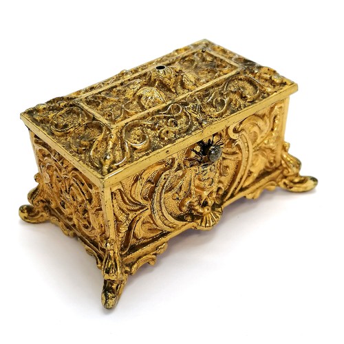 387 - Antique gilt brass Egyptian revival go-to-bed / ring box ~ 7.5cm across & 4cm high & in good conditi... 