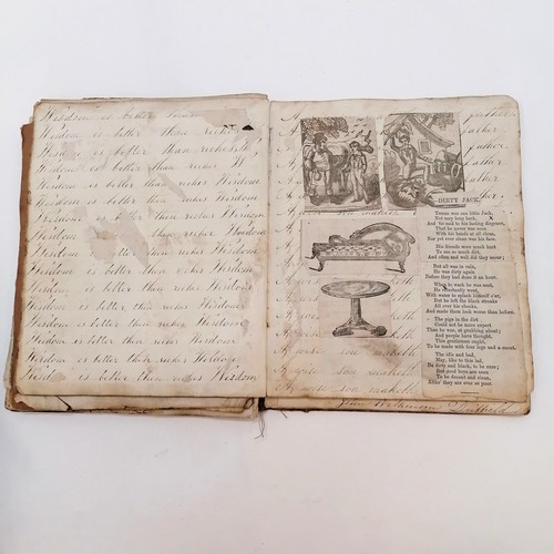 392 - 19th century exercise book converted into a scrap book