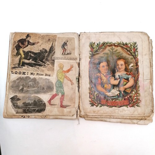 392 - 19th century exercise book converted into a scrap book