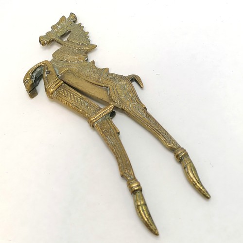 495 - Pair of brass betel nut cutters shaped as a horse, 19cm length