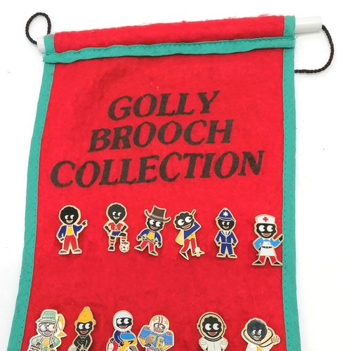 503 - Golly brooch collection of 48 (1990's acrylics) on original felt wall hanger