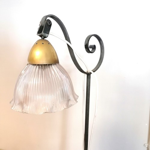 513 - Wrought iron adjustable standard lamp with holophane shade - 156cm high